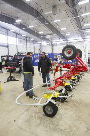 Checking out a hay tedder at the 2015 WNY Farm Show